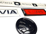 Octavia IV - original Skoda SPORTLINE / RS black emblem set - SKODA + OCTAVIA + RS + FRONT logo -F9R
Click to view details.