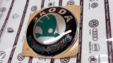 Superb II 09-13 - oryginalny emblemat Skoda Auto,a.s. - stara zielona wersja