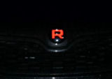 Octavia III - osłona emblematu R-line - czarny błyszczący - czerwony